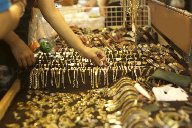 handmade jewelry bracelets at the market clipart
