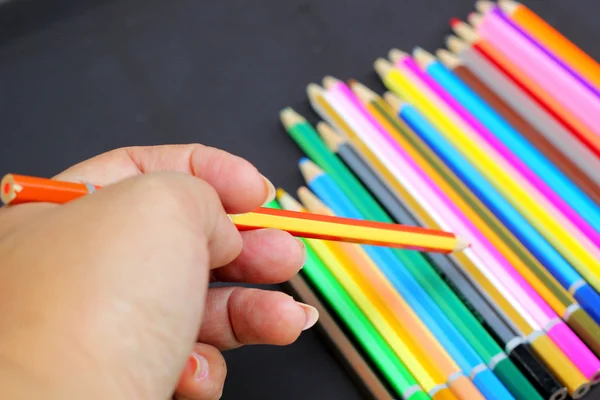 Colorful pencils on black background — Stock Photo, Image