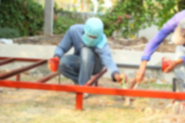 Bauarbeiter bekommen lackierten Stahl — Stockfoto