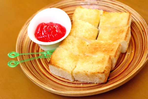 Bread, butter and strawberry jam — Stock Photo, Image