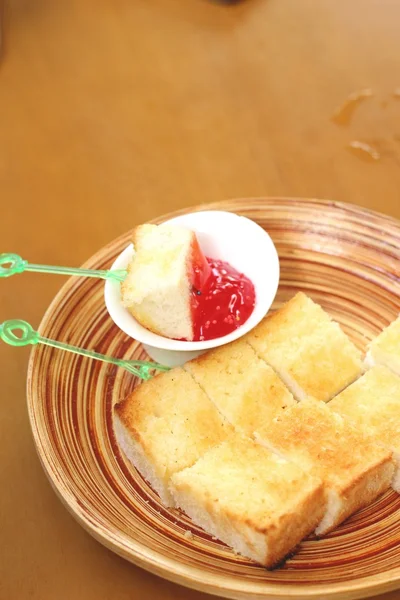 Bread, butter and strawberry jam — Stock Photo, Image