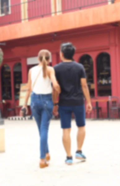 Blurred of couple in the park — Stock Photo, Image