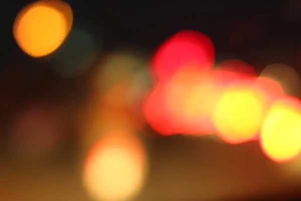 Wazig van auto in de stad 's nachts — Stockfoto