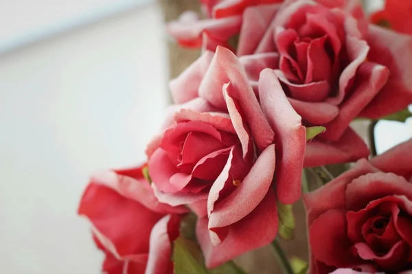 Beautiful vintage roses of artificial flowers — Stock Photo, Image