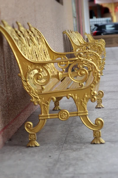 Golden chair in the park. — Stock Photo, Image