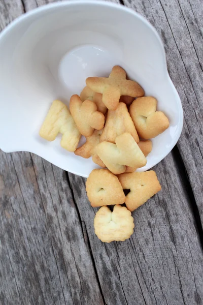 Salty crackers delicious is on the wood background — Stock Photo, Image