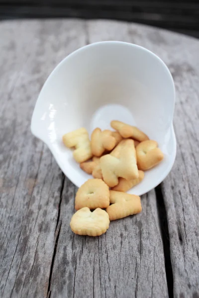 Salty crackers delicious is on the wood background — Stock Photo, Image