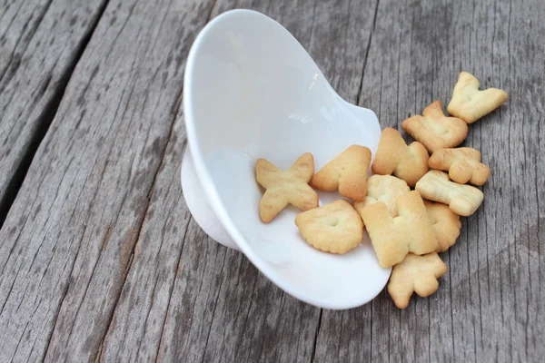 Salty crackers delicious is on the wood background — Stock Photo, Image