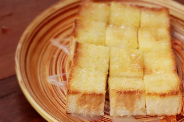 Bread, butter, topped milk with tasty. — Stock Photo, Image