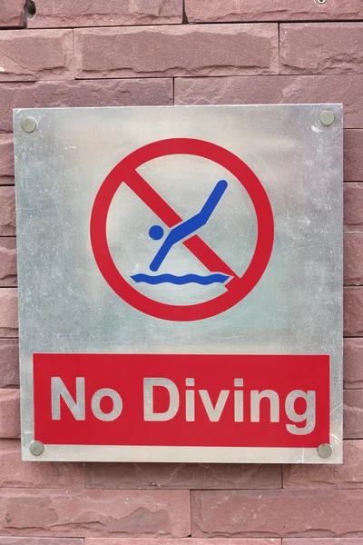 Prohibition sign jump off into the pool on the floor — Stock Photo, Image