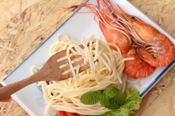 Pasta spaghetti with shrimp on the plate. — Stock Photo, Image