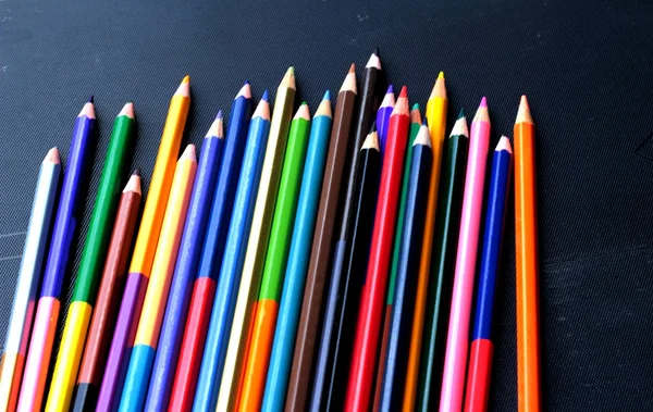 Colorful pencils - isolated on black background — Stock Photo, Image