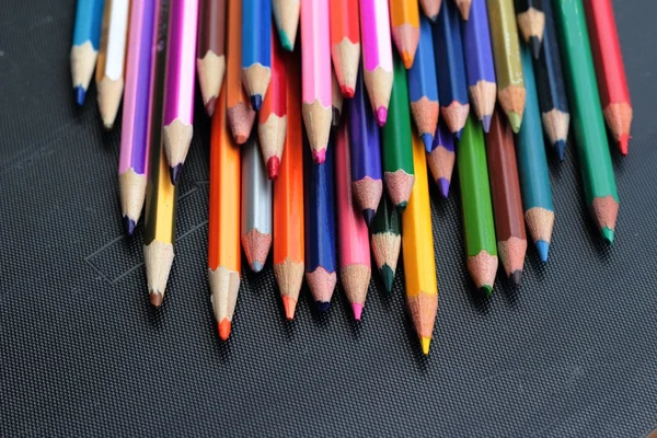 Colorful pencils - isolated on black background — Stock Photo, Image
