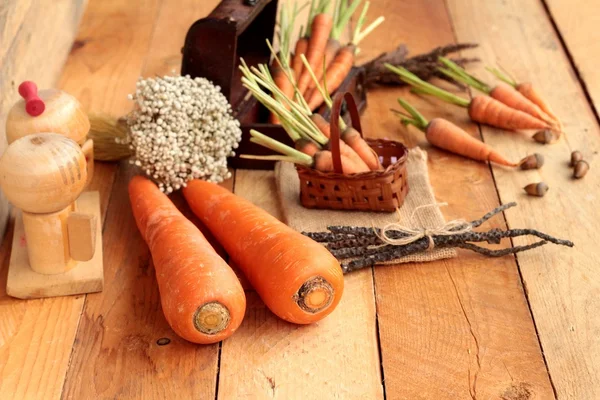 Fresh carrot on wood background — Stock Photo, Image