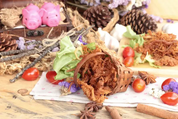 stock image Dry roast pork into strips.