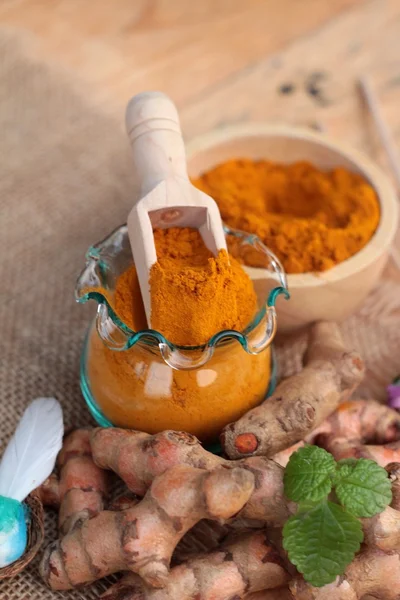 Turmeric herb yellow powder and fresh turmeric. — Stock Photo, Image