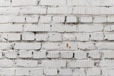 Tuğla duvar dokusu arka plan. Beyaz boyalı tuğlaların klasik grunge sıraları. Tasarım konsepti 