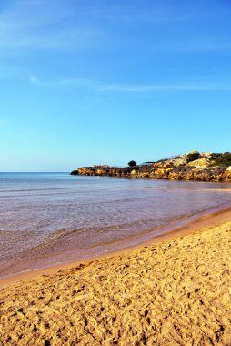 Punta Braccetto plajında gün batımı, ragusa, Sicilya, İtalya