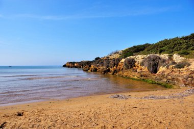 Punta Braccetto plajında gün batımı, ragusa, Sicilya, İtalya
