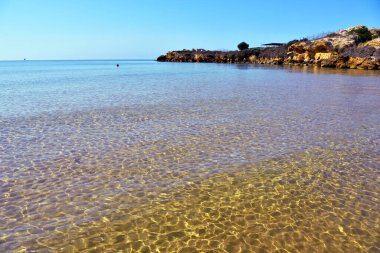 Punta Braccetto plajında gün batımı, ragusa, Sicilya, İtalya