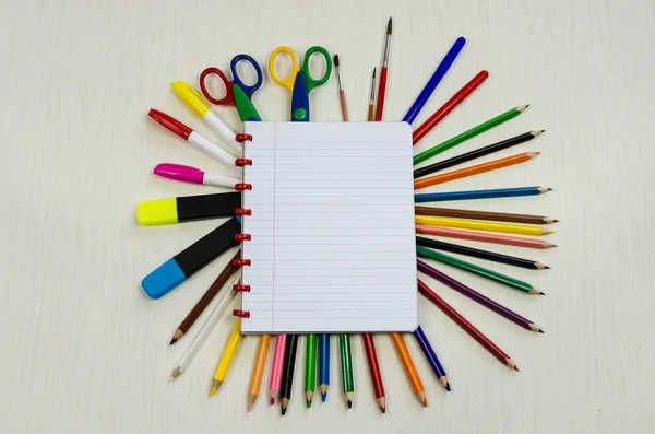 Notepad and colorful office supplies — Stock Photo, Image