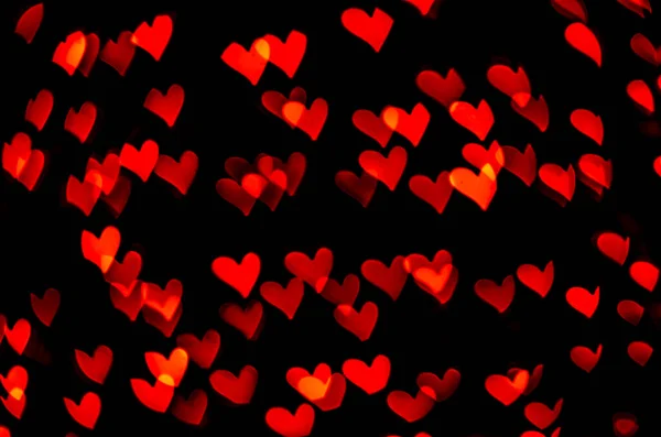 Red Heart Shape Bokeh Black Background — Stock Photo, Image