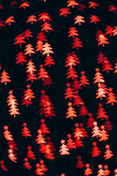Rote Weihnachtsbaumform Bokeh Auf Schwarzem Hintergrund — Stockfoto