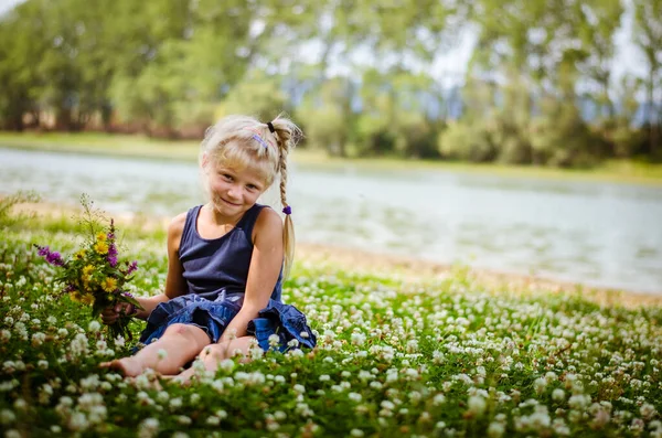 Adorable Charming Blond Girl Sitting Green Floral Meadow Bunch Wild — Stock Photo, Image