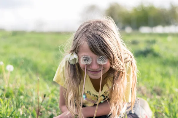 Adorable Girl Long Blond Hair Making Faces Dandelion Flowers Green — Stock Photo, Image