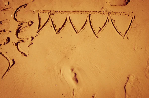 Beach party drawn into sand — Stock Photo, Image