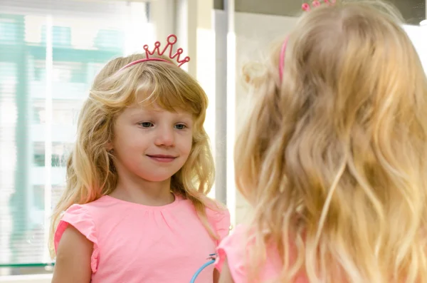 Blond girl in mirror — Stock Photo, Image