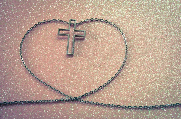 Cross symbol in love shape — Stock Photo, Image