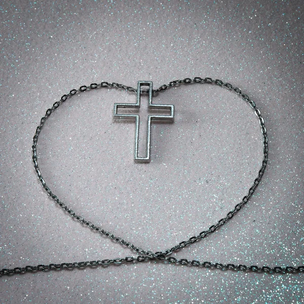 Cross symbol in chain — Stock Photo, Image