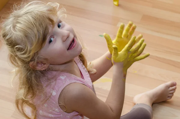 Girl with painted hands — Stock Photo, Image