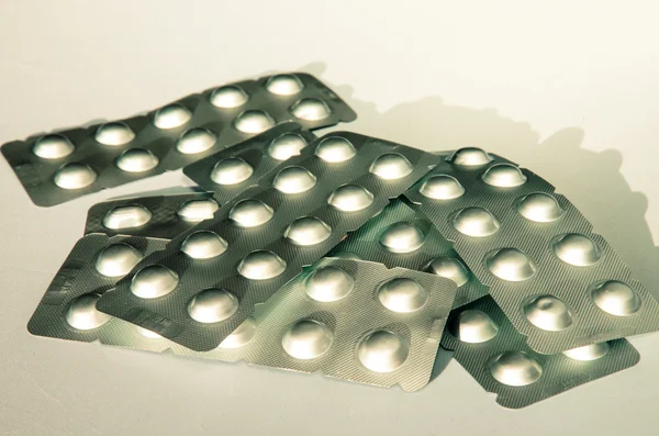 Set de píldoras de plata aisladas en blanco — Foto de Stock