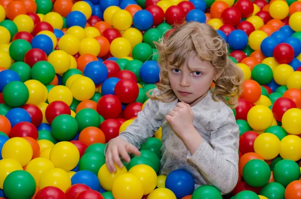 Happy girl playing with balls — Stock Photo, Image