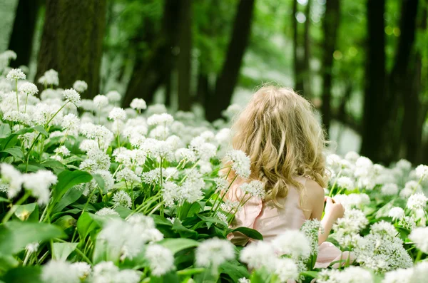 Mysterious child in white meadow — Stock Photo, Image