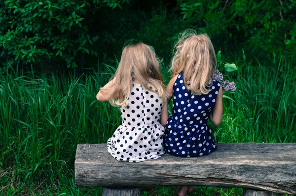 Blond girls sitting — Stock Photo, Image