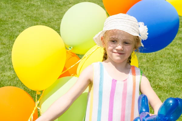 Girl with balloons — Stock Photo, Image