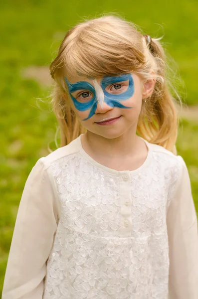 Flicka med facepainting — Stockfoto