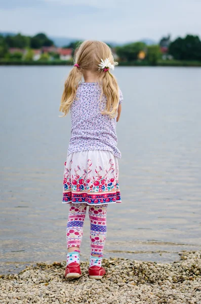 Girl with long braid hair — Stockfoto