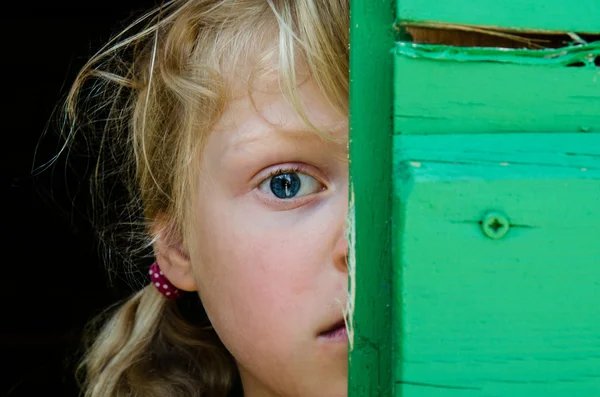 Portrait of girl with big blue eye — Stock Photo, Image
