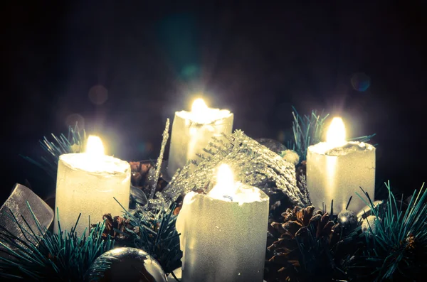 Cuatro velas encendidas —  Fotos de Stock