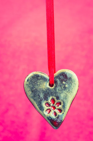 Ceramics heart on lace — Stock Photo, Image