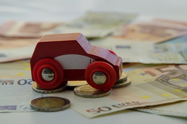 Auto rossa e denaro — Foto Stock