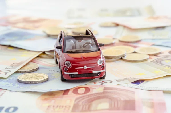 Red car and money — Stock Photo, Image