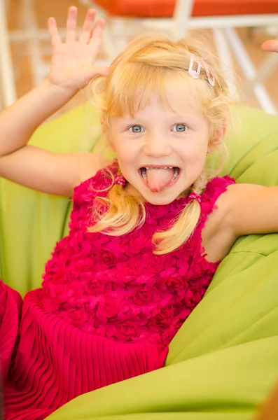 Girl doing faces — Stock Photo, Image