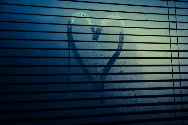 Heart on steamy window — Stock Photo, Image