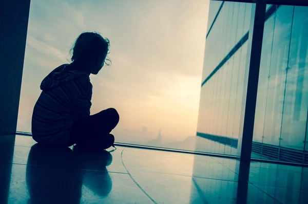 Child by the window — Stock Photo, Image