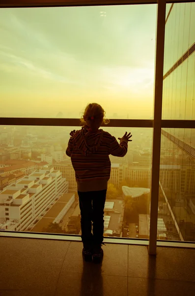 Kid at the window — Stock Photo, Image